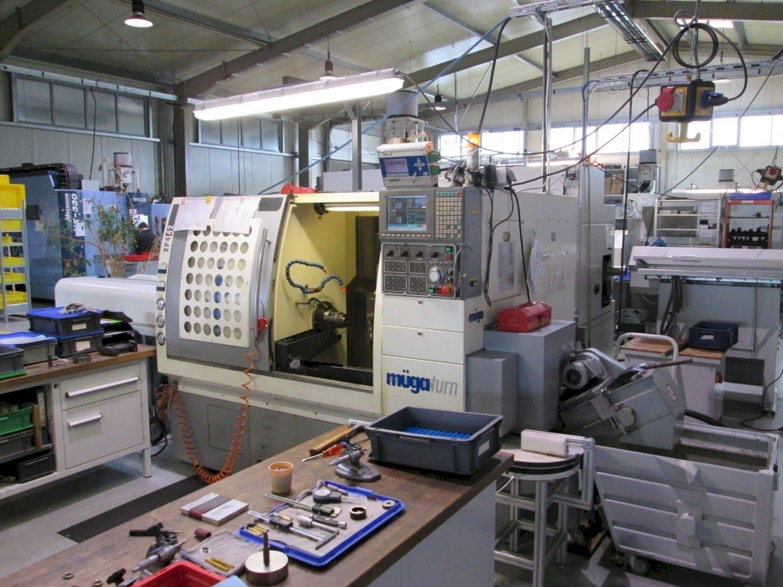 Widok z przodu maszyny Muga XP4 – 42SM